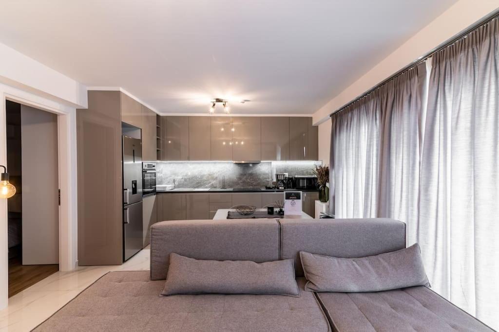 Μεζονέτα Με Θέα Στο Πάρκο Σταύρος Νιάρχος One Apartamento Atenas Exterior foto