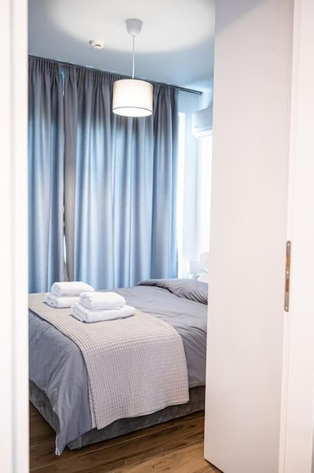 Μεζονέτα Με Θέα Στο Πάρκο Σταύρος Νιάρχος One Apartamento Atenas Exterior foto